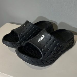 Hoka black rubber slides